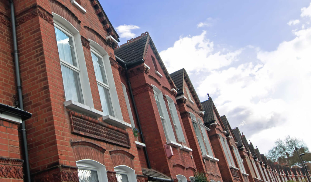 Row of cosy residential terraced houses, London City Mortgages