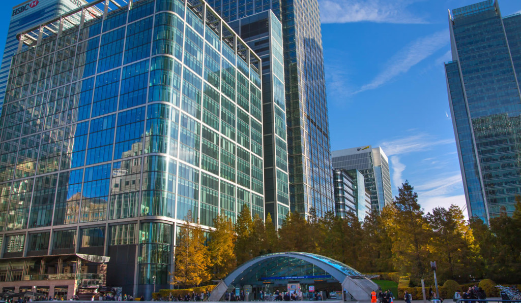 Busy Canary Wharf towers and park London City Mortgages