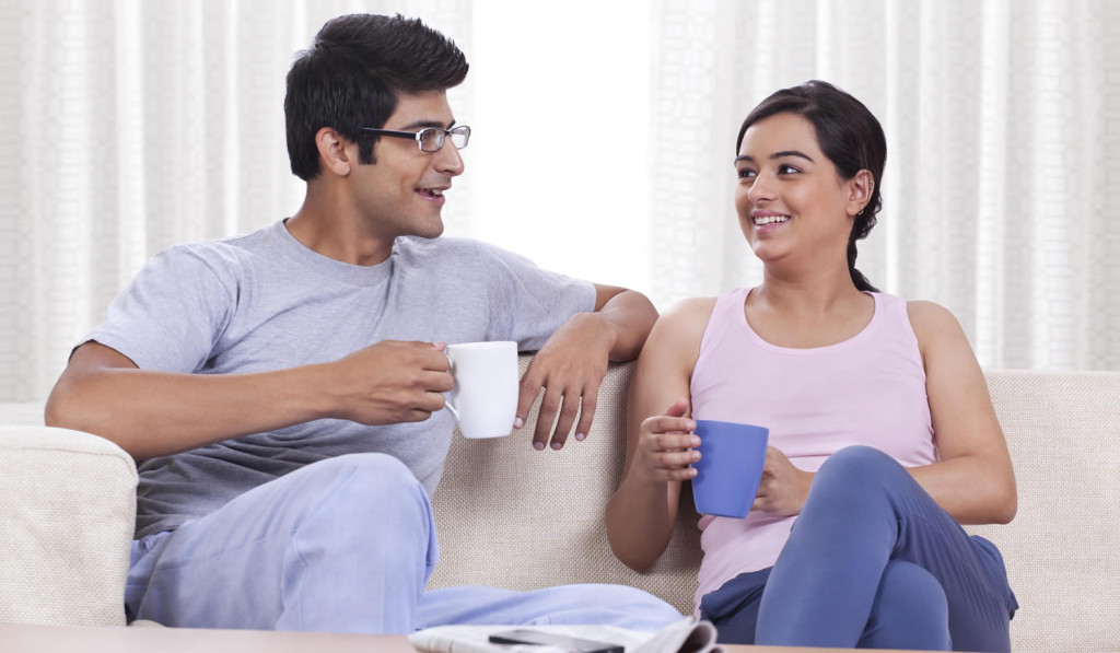 Property livingroom couple drinking coffee London City Mortgages